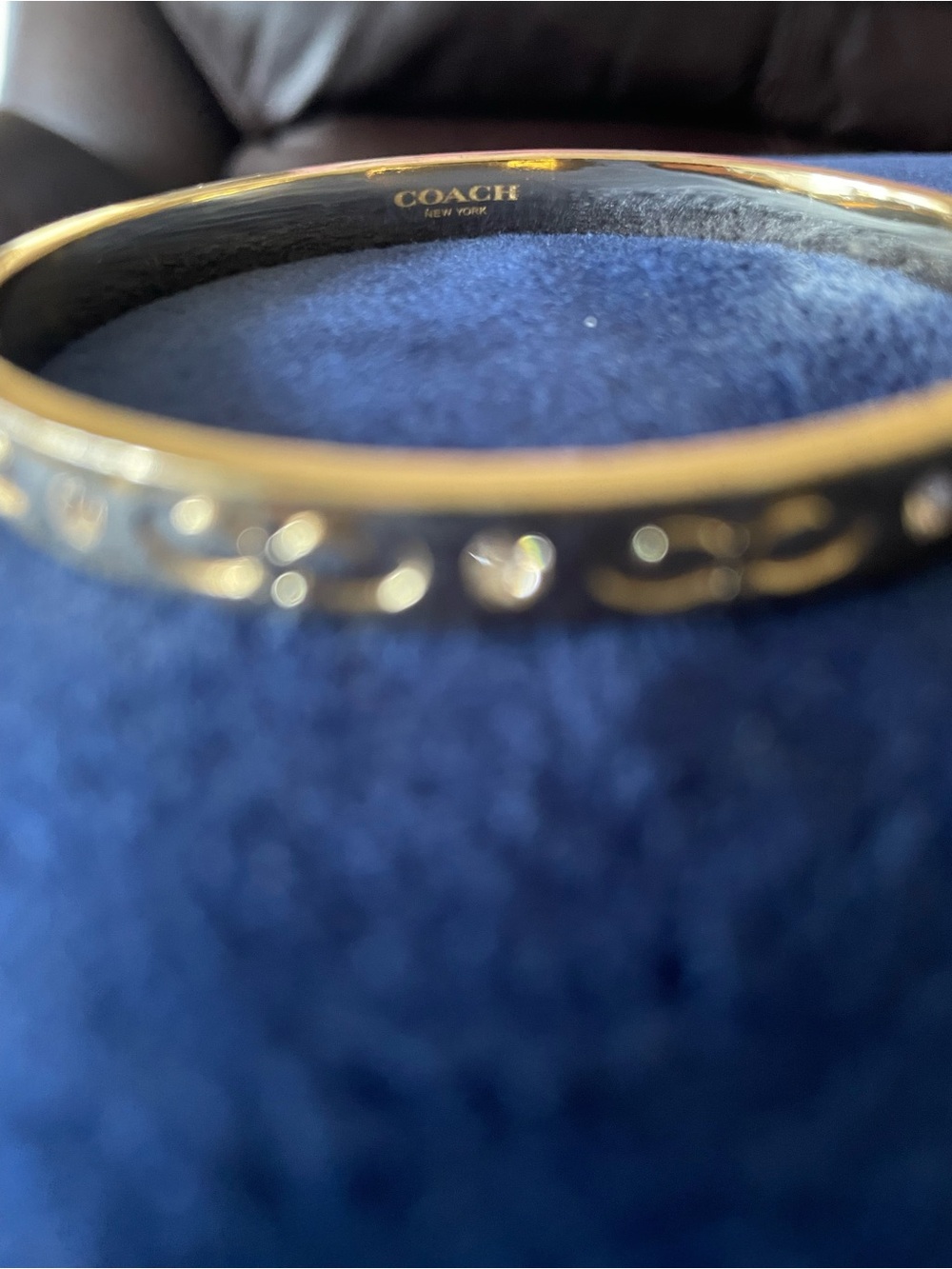Coach Gold-Tone Signature Cutout Bangle Bracelet